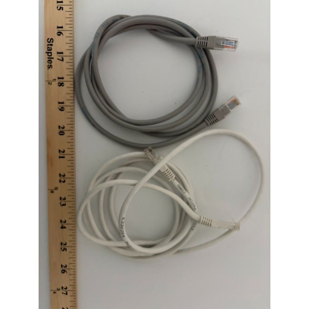 2 - ethernet patch cables one grey and one white with RJ45 connectors
